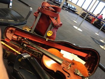 fiddle & whistle in the airport